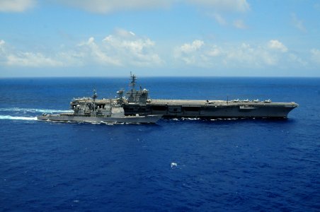 US Navy 100221-N-0808V-081 The guided-missile cruiser USS Bunker Hill (CG 52) pulls alongside the aircraft carrier USS Carl Vinson (CVN 70) for a refueling-at-sea