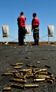 US Navy 100219-N-3595W-005 Members of the weapons department, G2 Gunnery Division of the aircraft carrier USS Dwight D. Eisenhower (CVN 69) hold small arms qualifications
