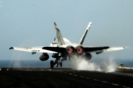 US Navy 100222-N-3038W-033 An F-A-18C Hornet assigned to the Warhawks of Strike Fighter Squadron (VFA) 97 launches from the aircraft carrier USS Nimitz (CVN 68)