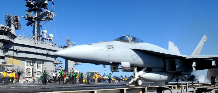 US Navy 100220-N-4236E-247 An F-A-18E Super Hornet from the Pukin Dogs of Strike Fighter Squadron (VFA) 143 prepares to launch from the flight deck of the Nimitz-class aircraft carrier USS Dwight D. Eisenhower (CVN 69)