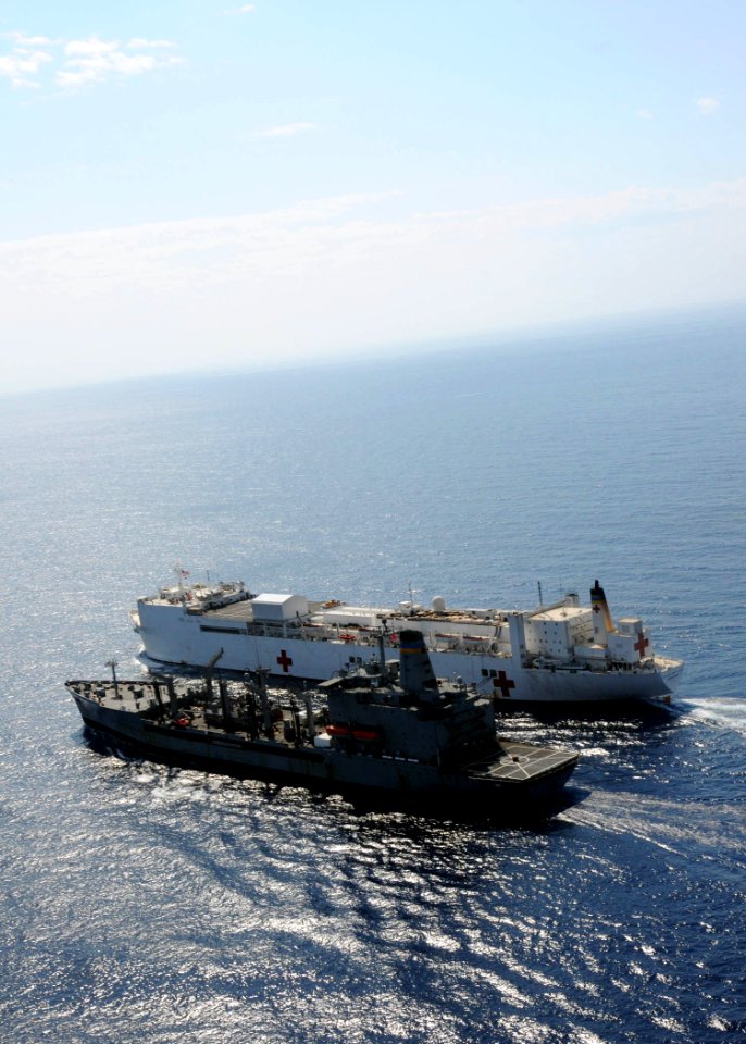 US Navy 100222-N-6410J-057 The Military Sealift Command hospital ship USNS Comfort (T-AH 20) and the fleet replenishment oiler USNS Leroy Grumman (T-AO 195) conduct an underway replenishment in the Caribbean Sea