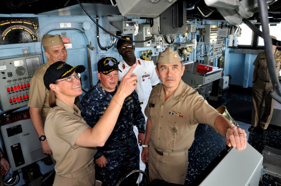 US Navy 100223-N-3289C-519 Vice Adm. Harry B. Harris Jr., commander of U.S. 6th Fleet, tours the bridge of the amphibious dock landing ship USS Gunston Hall
