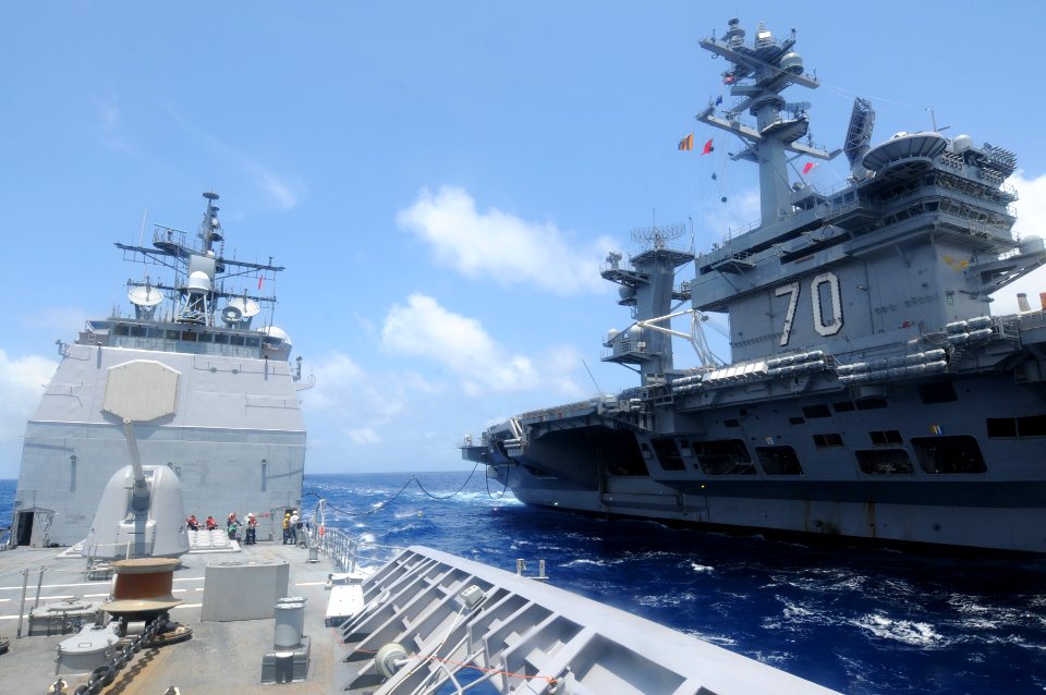 US Navy 100221-N-4275C-004 The guided-missile cruiser USS Bunker Hill (CG 52) takes on fuel from the Nimitz-class carrier USS Carl Vinson (CVN 70) during an underway replenishment near South America