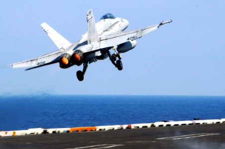 US Navy 100223-N-3038W-020 An F-A-18C Hornet launches from USS Nimitz (CVN 68) photo