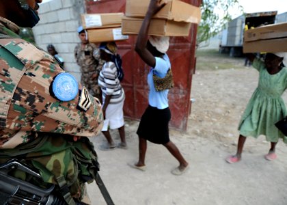 US Navy 100224-N-5961C-010 U.N. peacekeepers from Jordan provide security at a shelter distribution point outside Port-au-Prince