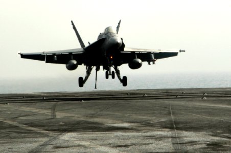 US Navy 100222-N-3038W-075 An F-A-18C Hornet assigned to the Sidewinders of Strike Fighter Squadron (VFA) 86 lands aboard the aircraft carrier USS Nimitz (CVN 68) photo