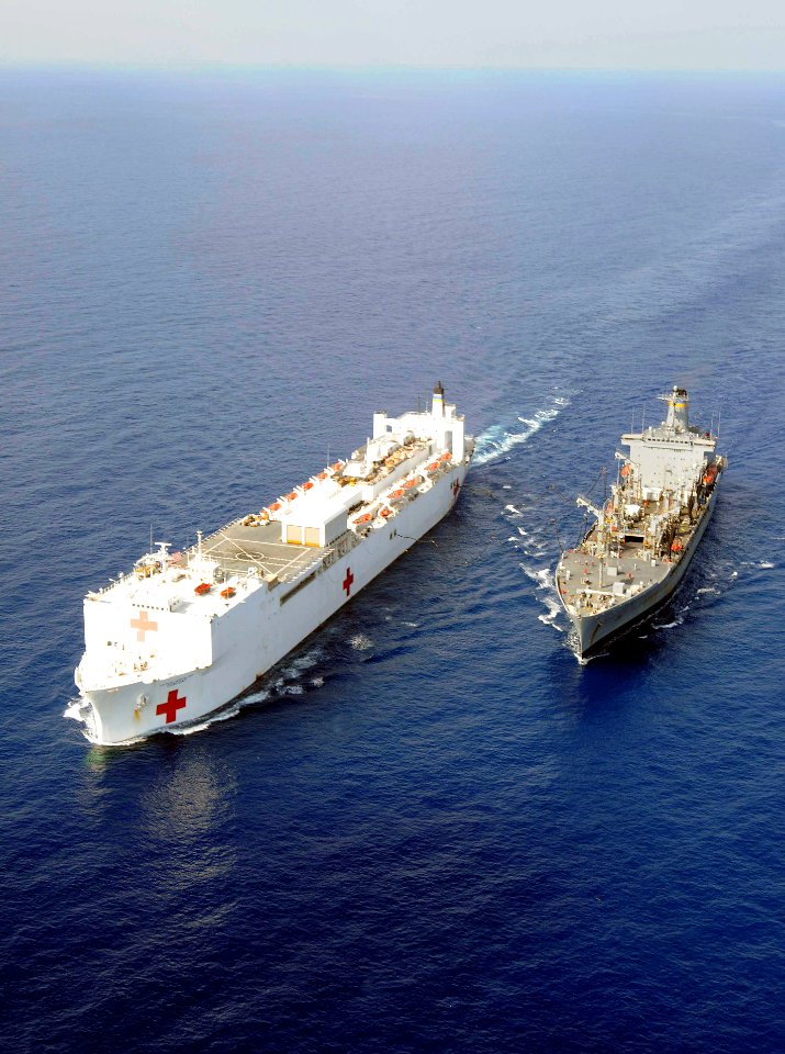 US Navy 100222-N-6410J-026 The Military Sealift Command hospital ship USNS Comfort (T-AH 20), left, and the Military Sealift Command fleet replenishment oiler USNS Leroy Grumman (T-AO 195) conduct an underway replenishment