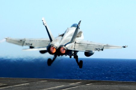 US Navy 100225-N-3038W-646 An F-A-18C Hornet assigned to the Warhawks of Strike Fighter Squadron (VFA) 97 launches from the aircraft carrier USS Nimitz (CVN 68)