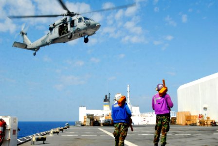 US Navy 100222-N-4047W-173 Sailors assigned to Helicopter Sea Combat Squadron (HSC) 28, embarked aboard the Military Sealift Command hospital ship USNS Comfort (T-AH 20) photo