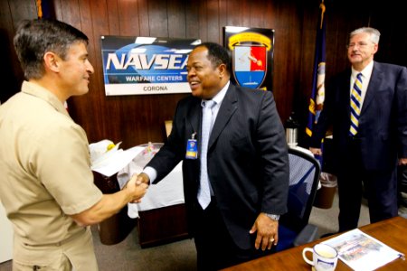 US Navy 100225-N-8863V-299 Capt. Jay Kadowaki, left, commanding officer of the Corona Division of Naval Surface Warfare Center (NSWC), and Dr. William Luebke, right, technical director for NSWC Corona, welcome Deputy Secretary photo