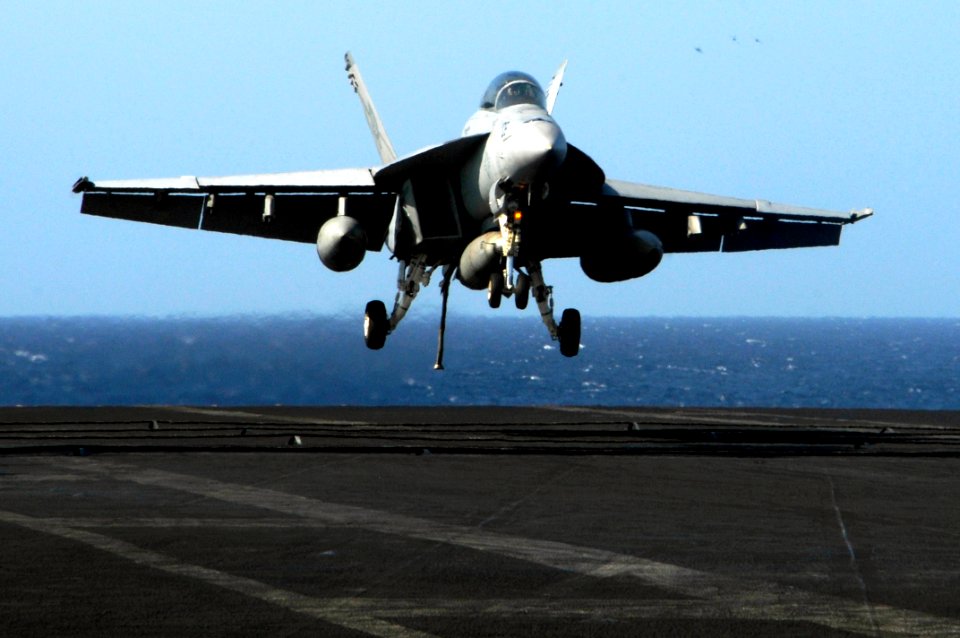 US Navy 100226-N-3038W-279 An F-A-18F Super Hornet assigned to the Black Aces of Strike Fighter Squadron (VFA) 41 lands aboard the aircraft carrier USS Nimitz (CVN 68)