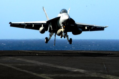 US Navy 100226-N-3038W-279 An F-A-18F Super Hornet assigned to the Black Aces of Strike Fighter Squadron (VFA) 41 lands aboard the aircraft carrier USS Nimitz (CVN 68)