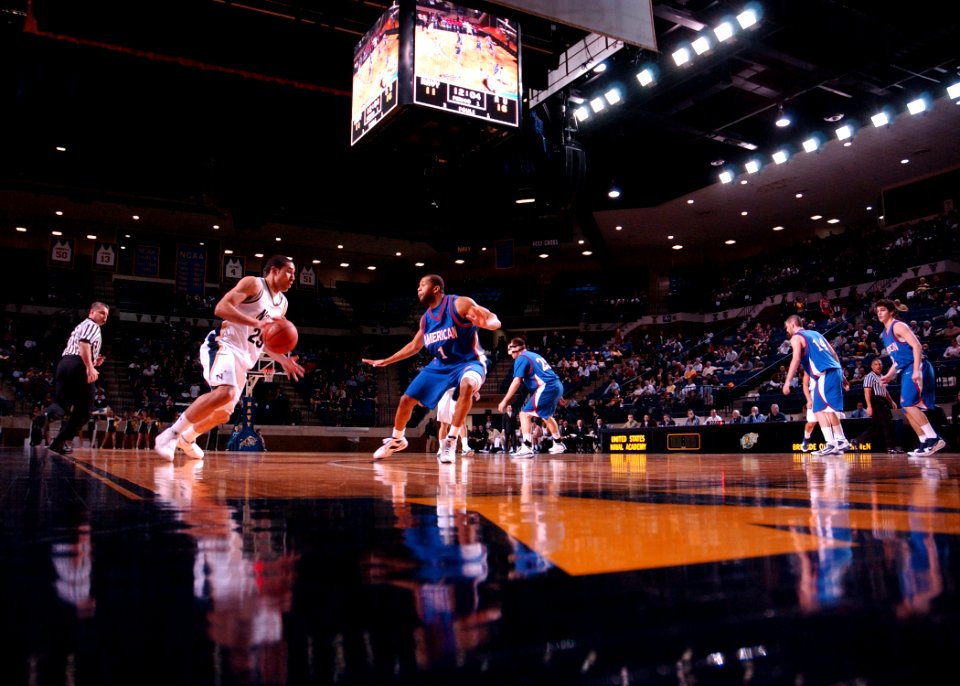 US Navy 100224-N-3857R-068 Midshipman 3rd Class Jordan Sugars drives towards the basket during the final home game of the season at the U.S. Naval Academy, in Annapolis, Md