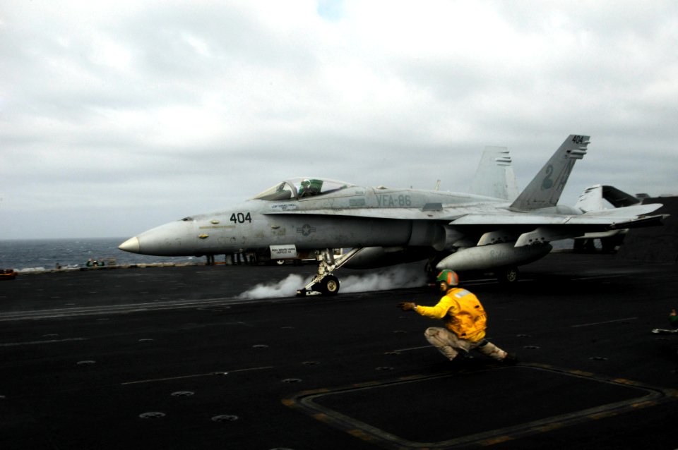 US Navy 100227-N-3038W-069 An F-A-18C Hornet launches from USS Nimitz (CVN 68)