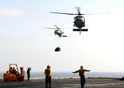 US Navy 100225-N-4236E-212 An HH-60H Sea Hawk helicopter assigned to the Nightdippers of Helicopter Anti-Submarine Squadron (HS) 5 and an MH-60S Sea Hawk helicopter assigned to the Chargers of Helicopter Sea Combat Squadron (HS