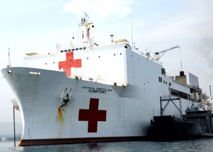 US Navy 100225-N-6410J-070 Civilian mariners aboard the Military Sealift Command hospital ship USNS Comfort (T-AH 20) offload more than 100 pallets of medical supplies onto a landing craft utility