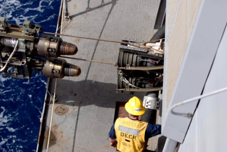 US Navy 100228-N-3358S-125 A Sailor aboard the amphibious transport dock ship USS Mesa Verde (LPD 19) monitors the incoming fuel lines from the Military Sealift Command dry cargo and ammunition ship USNS Robert E. Peary (T-AKE