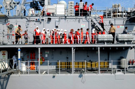 US Navy 100225-N-8335D-406 Children from an orphanage in Batam, Indonesia tour the mine counter-measures ship USS Patriot (MCM 7)