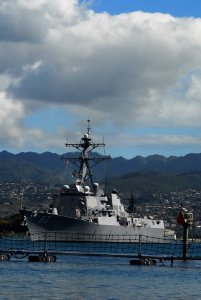 US Navy 100227-N-0995C-020 The guided-missile destroyer USS Chung-Hoon (DDG 93) makes its way out of Naval Station Pearl Harbor as the state of Hawaii is expecting a tsunami generated by an earthquake near Chile