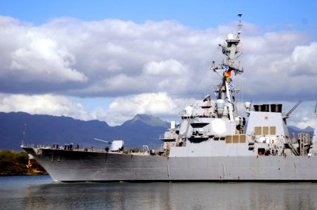 US Navy 100227-N-7498L-002 The guided-missile destroyer USS O'Kane (DDG 77) makes its way out of Naval Station Pearl Harbor as the state of Hawaii prepares for a possible tsunami