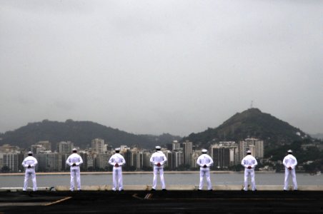 US Navy 100226-N-6006S-153 Sailors aboard the aircraft carrier USS Carl Vinson (CVN 70) man the rails before the ship anchors off the coast of Rio de Janeiro