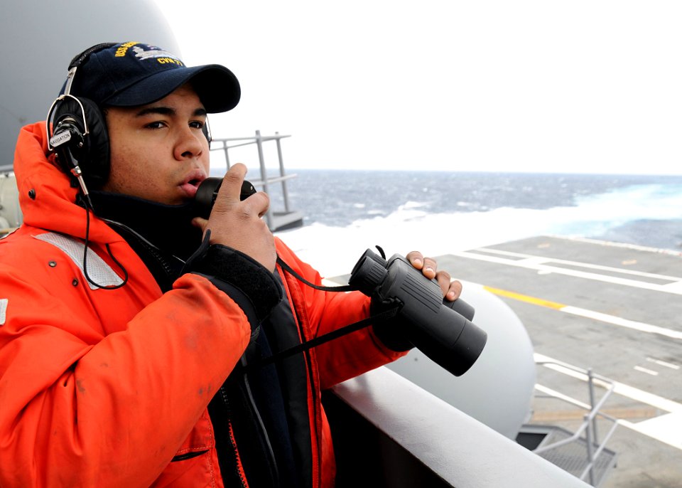 US Navy 100227-N-3885H-095 Seaman Kyle Tugman stands port lookout aboard USS George H.W. Bush (CVN 77)