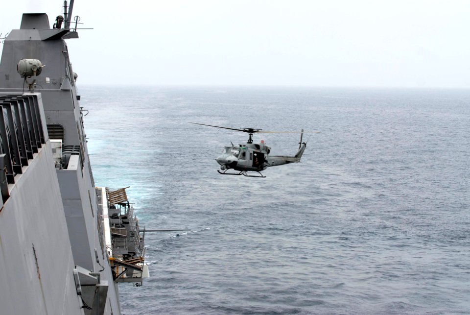US Navy 100302-N-3358S-032 A UH-1N Huey helicopter returns Marines from the 24th Marine Expeditionary Unit (24th MEU) to the amphibious transport dock ship USS Mesa Verde (LPD 19)