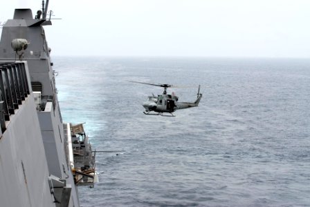 US Navy 100302-N-3358S-032 A UH-1N Huey helicopter returns Marines from the 24th Marine Expeditionary Unit (24th MEU) to the amphibious transport dock ship USS Mesa Verde (LPD 19)