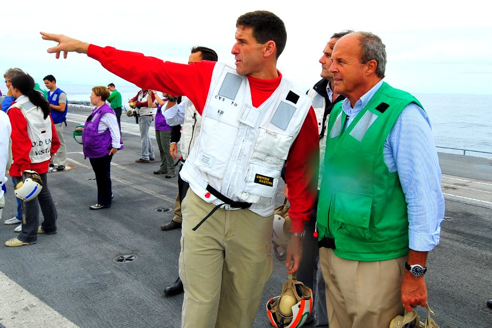 US Navy 100302-N-2953W-593 Cmdr. Putnam H. Browne, executive officer of the aircraft carrier USS Carl Vinson (CVN 70), explains flight operations to a Brazilian visitor before a flight demonstration