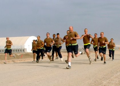 US Navy 100227-N-9564W-135 Seabees assigned to Naval Mobile Construction Battalion (NMCB) 74 compete in a Krutke Olympics 5-Kilometer race through Camp Leatherneck