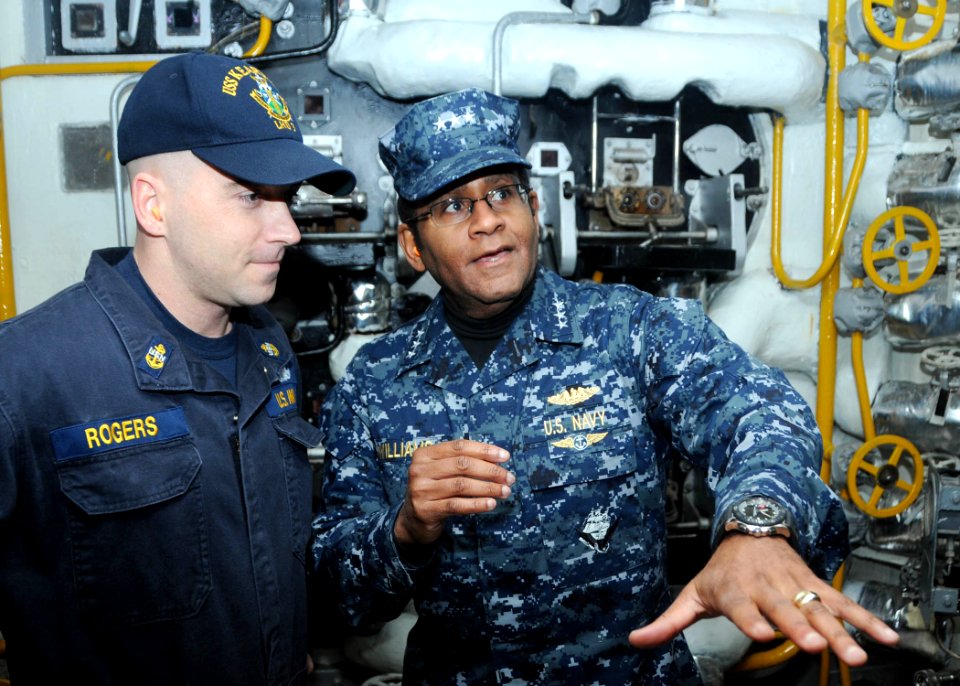 US Navy 100302-N-6764G-080 Vice Adm. Mel Williams Jr., commander of U.S. 2nd Fleet, asks Chief Machinist's Mate Hurdis Rogers about the engineering spaces aboard the amphibious assault ship USS Kearsarge (LHD 3)