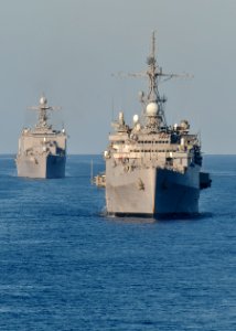US Navy 100302-N-9950J-019 The amphibious transport dock ship USS Denver (LPD 9) and the dock landing ship USS Harpers Ferry (LSD 49) prepare to conduct an underway replenishment