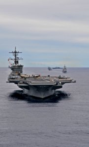 US Navy 100302-N-8878B-184 The aircraft carrier USS Carl Vinson (CVN 70) and the guided-missile cruiser USS Bunker Hill (CG 52) transit in formation off the coast of Rio de Janeiro