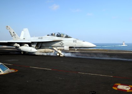 US Navy 100228-N-4236E-049 An F-A-18F Super Hornet strike fighter assigned to the Jolly Rogers of Strike Fighter Squadron (VFA) 103 launches from the Nimitz-class aircraft carrier USS Dwight D. Eisenhower (CVN 69)