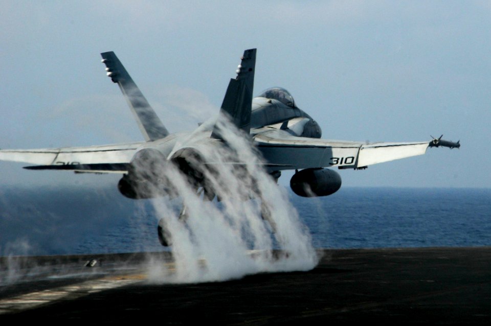 US Navy 100303-N-3038W-749 An F-A-18C Hornet assigned to the Warhawks of Strike Fighter Squadron (VFA) 97 launches from the aircraft carrier USS Nimitz (CVN 68)