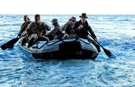 US Navy 100303-N-9950J-060 Marines assigned to the 31st Marine Expeditionary Unit (31st MEU) launch a combat rubber raiding craft photo