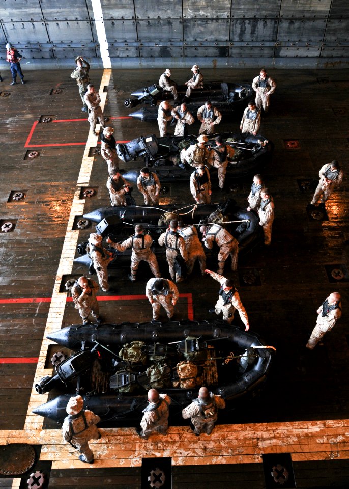 US Navy 100303-N-9950J-010 Marines assigned to the 31st Marine Expeditionary Unit (31st MEU) prepare to board combat rubber raiding craft