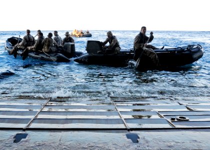 US Navy 100303-N-9950J-206 Marines assigned to the 31st Marine Expeditionary Unit (31st MEU) launch combat rubber raiding craft