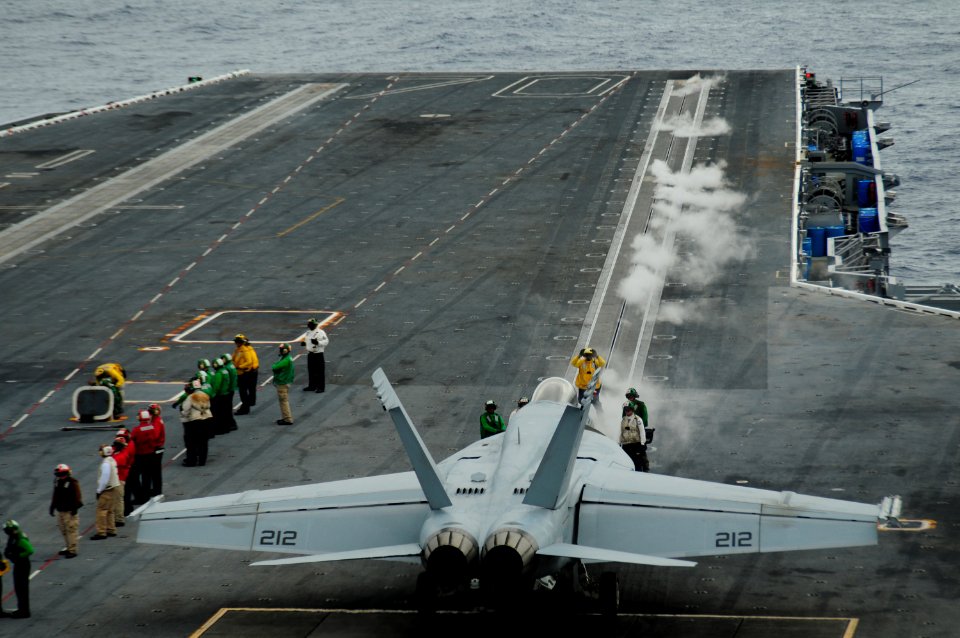 US Navy 100303-N-0808V-145 An F-A-18 Super Hornet launches from the aircraft carrier USS Carl Vinson (CVN 70) as part of an air demonstration for Brazilian guests