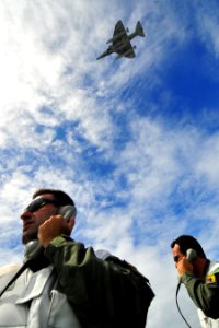 US Navy 100303-N-2953W-133 Brazilian officers stand watch on the landing signal officer platform on the flight deck of the nuclear-powered aircraft carrier aboard the USS Carl Vinson (CVN 70)