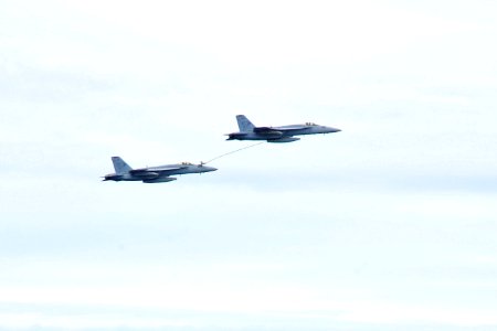 US Navy 100302-N-2953W-681 An F-A-18 Super Hornet refuels during a flight demonstration aboard aircraft the carrier USS Carl Vinson (CVN 70)