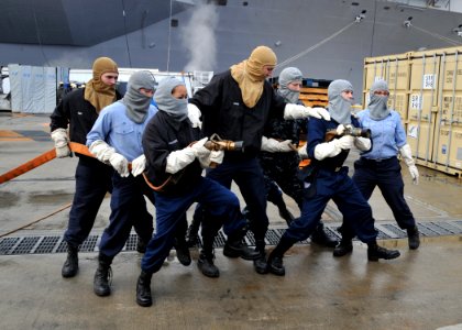 US Navy 100305-N-1644H-060 Sailors from Air Department aboard the aircraft carrier USS George Washington (CVN 73) practice hose handling techniques and aircraft fire procedures during a general quarters drill