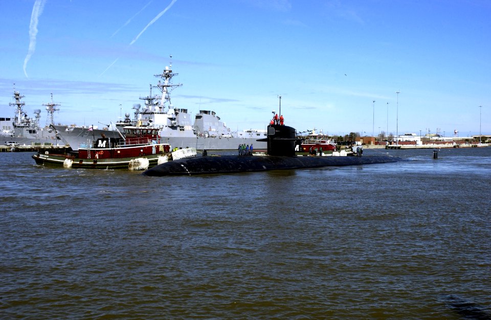 US Navy 100305-N-7705S-044 USS Norfolk (SSN 714) is guided from the pier as the ship departs Naval Station Norfolk