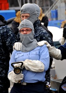 US Navy 100305-N-1644H-030 Sailors from Air Department aboard the aircraft carrier USS George Washington (CVN 73) practice hose handling techniques and aircraft fire procedures during a general quarters drill