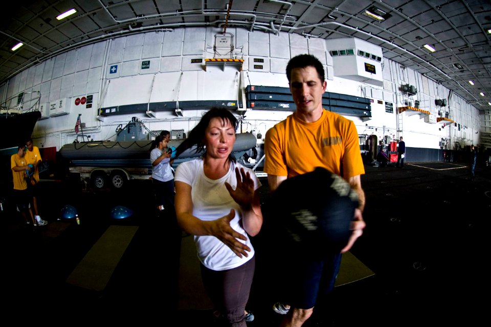 US Navy 100304-N-2953W-305 Chief Aviation Ordnanceman Patricia Wong, command fitness leader aboard the aircraft carrier USS Carl Vinson (CVN 70)