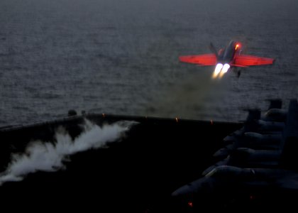 US Navy 100306-N-4236E-433 An F-A-18E Super Hornet assigned to the Pukin Dogs of Strike Fighter Squadron (VFA) 143 catapults from the flight deck of the Nimitz-class aircraft carrier USS Dwight D. Eisenhower (CVN 69)