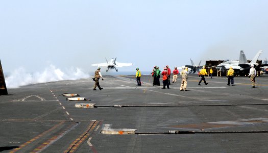 US Navy 100304-N-4236E-025 Two F-A-18E Super Hornets from the Pukin Dogs of Strike Fighter Squadron (VFA) 143 catapult from the Nimitz-class aircraft