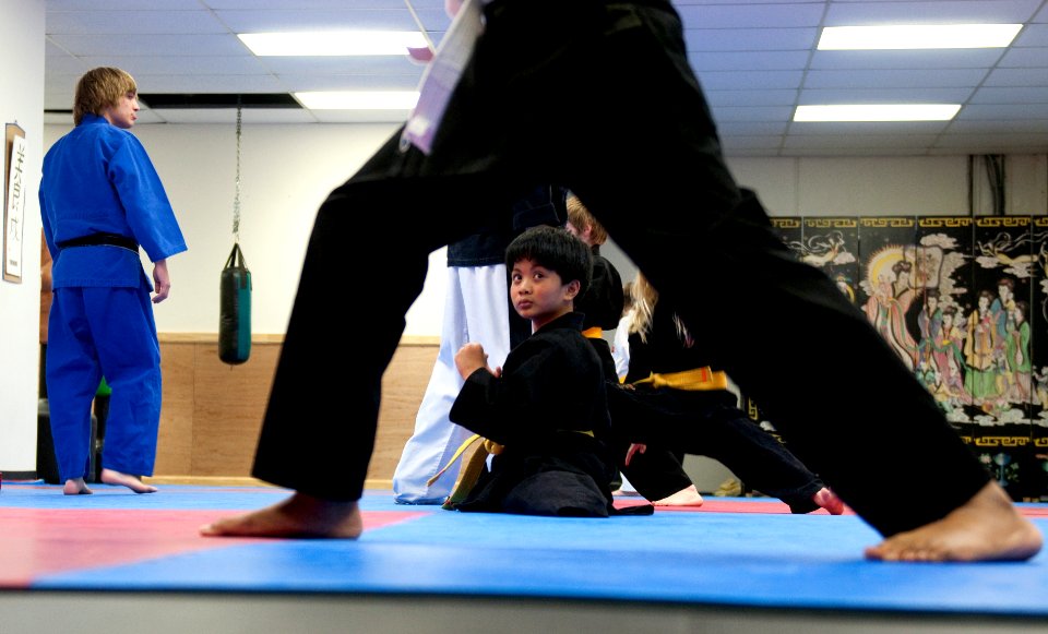 US Navy 100306-N-5319A-138 Ten-year-old Joseph Camano practices striking techniques and observes other students during a karate class at the Family Martial Arts Center in Virginia Beach, Va