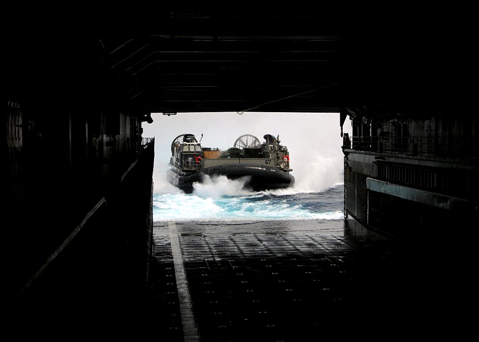 US Navy 100305-N-1082Z-009 Landing Craft Air Cushion (LCAC) 67, assigned to Assault Craft Unit (ACU) 4, approaches the well deck of the amphibious dock landing ship USS Ashland (LSD 48)