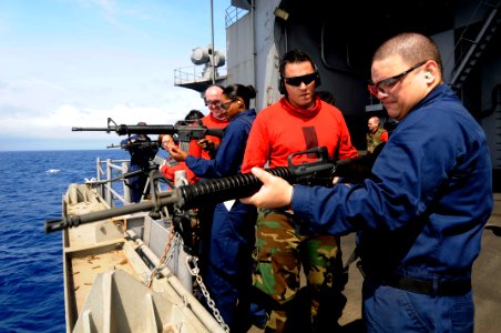 US Navy 100308-N-3038W-189 Sailors take part in a live-fire exercise aboard the aircraft carrier USS Nimitz (CVN 68)
